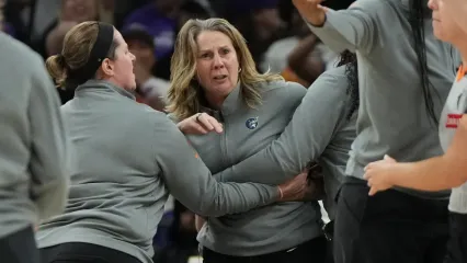 Sep 26, 2025; Phoenix, Arizona, USA; Minnesota Lynx head coach Cheryl Reeve is held back after being ejected during game three against the Phoenix Mercury of the second round for the 2025 WNBA Playoffs at PHX Arena. Mandatory Credit: Rick Scuteri-Imagn Images