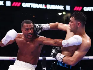 MANCHESTER, ENGLAND - JULY 05: Jack Catterall and Harlem Eubank exchange punches during their IBF Inter-Continental Welterweight title fight on 'The Warrior Code' fight card at AO Arena on July 05, 2025 in Manchester, England. (Photo by Alex Livesey/Getty Images)