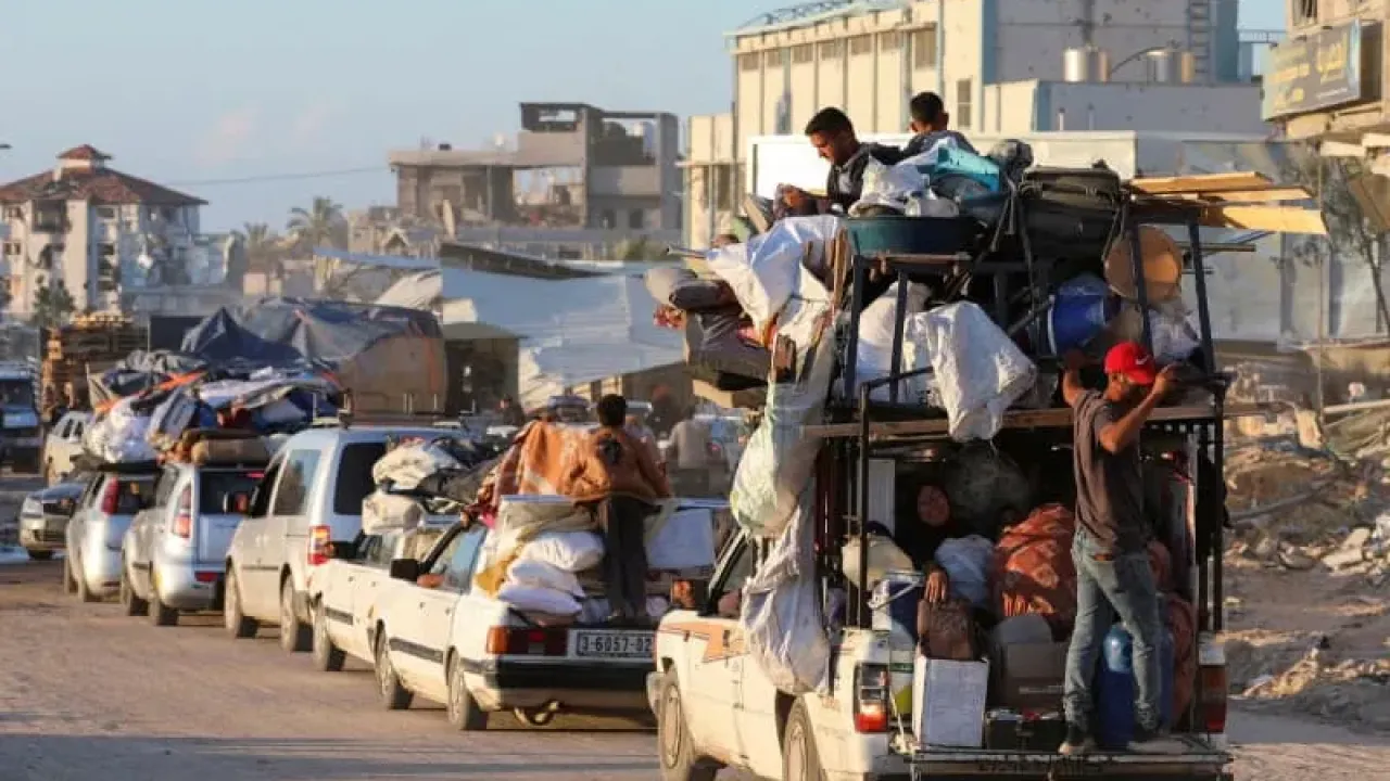 Palestinians evacuating amid the ongoing conflict between Israel and Hamas travel on a vehicle in Khan Younis in the Southern Gaza Strip May 6, 2024. (photo credit: Ramadan Abed/Reuters)