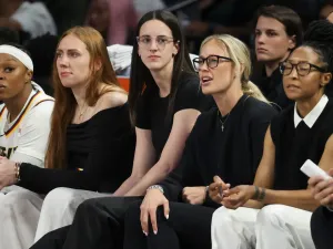 LAS VEGAS, NEVADA - SEPTEMBER 23: Caitlin Clark #22 of the Indiana Fever looks on from the bench in the third quarter of Game Two of the 2025 WNBA Playoffs semifinals against the Las Vegas Aces at Michelob ULTRA Arena on September 23, 2025 in Las Vegas, Nevada. NOTE TO USER: User expressly acknowledges and agrees that, by downloading and or using this photograph, User is consenting to the terms and conditions of the Getty Images License Agreement. (Photo by Ian Maule/Getty Images)