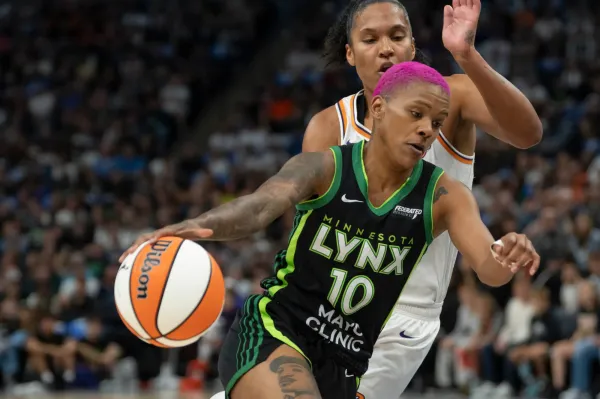 Sept. 21: The Minnesota Lynx's Courtney Williams (10) dribbles the ball past the Phoenix Mercury's Alyssa Thomas (25) during Game 1 at Target Center. Mandatory Credit: Jesse Johnson-Imagn Images