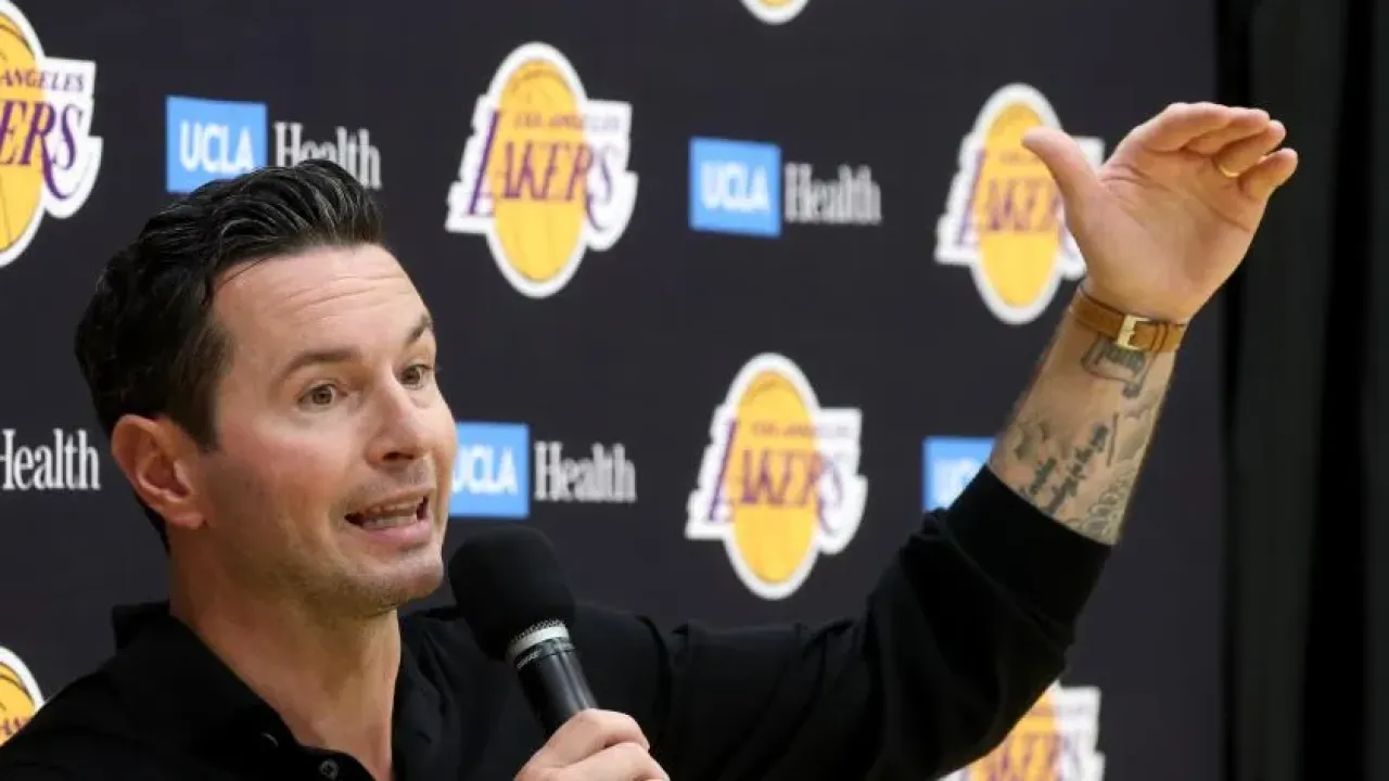 EL SEGUNDO, CA - SEPTEMBER 25, 2025 -- Lakers head coach JJ Redick fields answers a question during a press conference about the upcoming Lakers 2025-26 season at the UCLA Health Training Center in El Segundo on September 25, 2025. (Genaro Molina/Los Angeles Times)