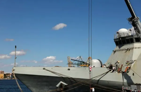 Crew members work aboard Spain's warship 'Furor', a military vessel set to join in a supporting role the Global Sumud Flotilla seeking to deliver aid to Gaza after it was attacked by drones off Greece, at the port of Cartagena, Spain September 25, 2025. (credit: SUSANA VERA/REUTERS)