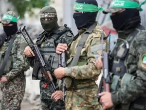 Hamas members stand at the funeral of Marwan Issa, a senior Hamas deputy military commander who was killed in an Israeli airstrike during the conflict between Israel and Hamas, in the central Gaza Strip, February 7, 2025. (photo credit: Ramadan Abed/Reuters)