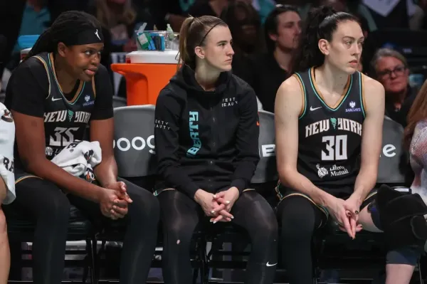 Left to right: Jonquel Jones, Sabrina Ionescu and Breanna Stewart watch from the bench during the Liberty’s Game 2 loss to the Mercury at Barclays Center. Wendell Cruz-Imagn Images