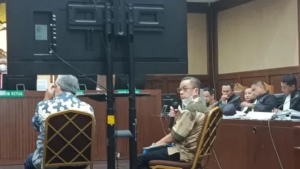 Kepala Bidang Pemanfaatan Disbud DKI nonaktif Mohamad Fairza Maulana dalam sidang di Pengadilan Tipikor pada Pengadilan Negeri Jakarta Pusat, Selasa (30/9/2025).