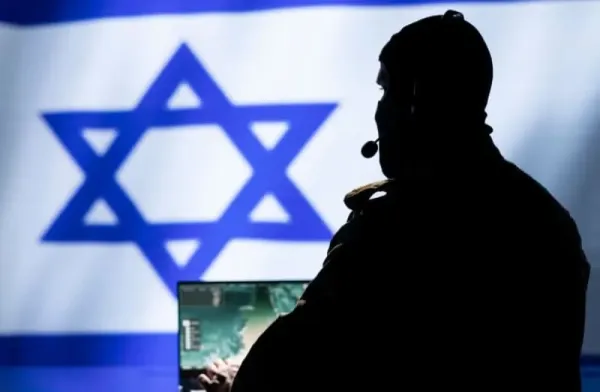 Iranian spy in intelligence agency control room uses military tech to identify threats during Arab Israeli conflict. Mossad secret agent uses software to do war covert operations (credit: SHUTTERSTOCK)