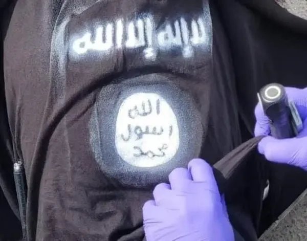 A shirt bearing ISIS insignia, found on a terrorist who attempted to carry out a terror attack in Qalandiya, the West Bank, December 7, 2024. (photo credit: Police Spokesperson )