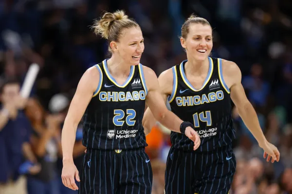 Aug 20, 2022; Chicago, Illinois, USA; Chicago Sky guard Courtney Vandersloot (22) celebrates with guard Allie Quigley (14) during the second half of Game 2 of the first round of the WNBA playoffs against the New York Liberty at Wintrust Arena. Mandatory Credit: Kamil Krzaczynski-USA TODAY Sports