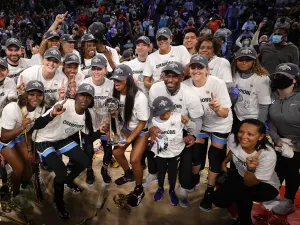 CHICAGO, ILLINOIS - OCTOBER 17: Members of the Chicago Sky pose with the trophy after defeating the Phoenix Mercury in Game Four of the WNBA Finals to win the championship at Wintrust Arena on October 17, 2021 in Chicago, Illinois. NOTE TO USER: User expressly acknowledges and agrees that, by downloading and or using this photograph, User is consenting to the terms and conditions of the Getty Images License Agreement. (Photo by Stacy Revere/Getty Images)