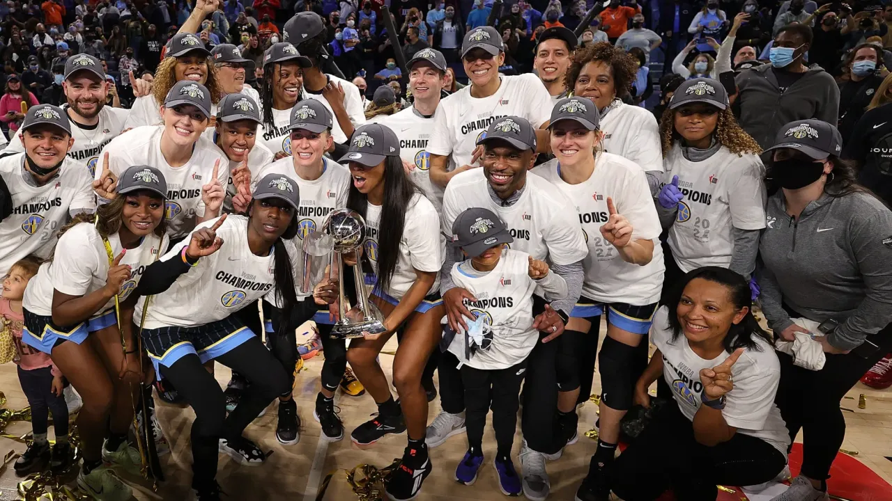 CHICAGO, ILLINOIS - OCTOBER 17: Members of the Chicago Sky pose with the trophy after defeating the Phoenix Mercury in Game Four of the WNBA Finals to win the championship at Wintrust Arena on October 17, 2021 in Chicago, Illinois. NOTE TO USER: User expressly acknowledges and agrees that, by downloading and or using this photograph, User is consenting to the terms and conditions of the Getty Images License Agreement. (Photo by Stacy Revere/Getty Images)