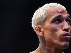 LAS VEGAS, NEVADA - JUNE 28: Charles Oliveira of Brazil enters the Octagon in the UFC lightweight championship bout during the UFC 317 event at T-Mobile Arena on June 28, 2025 in Las Vegas, Nevada. (Photo by Jeff Bottari/Zuffa LLC)