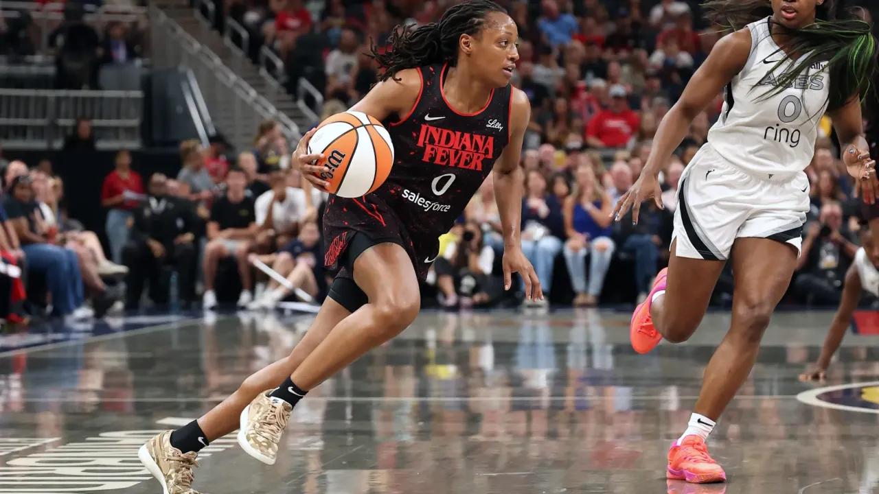 Kelsey Mitchell scored 34 points in helping the Indiana Fever to victory over the Las Vegas Aces on Sunday.