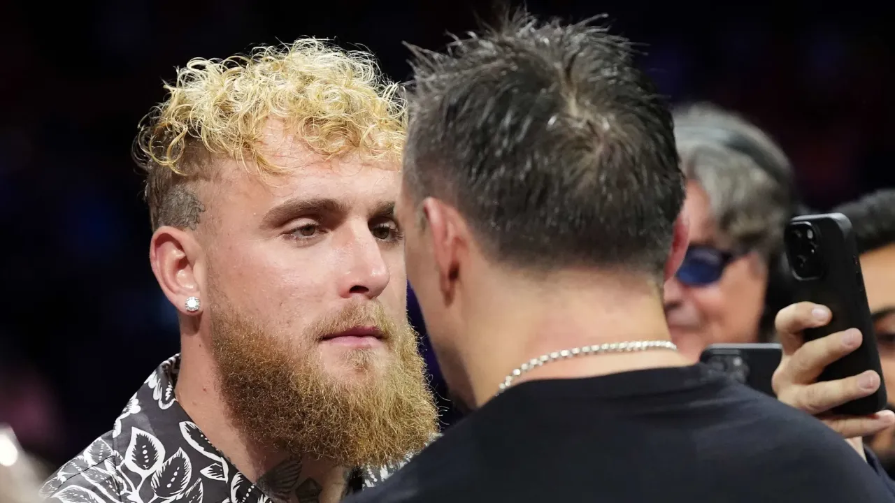 Oleksandr Usyk faces up to Jake Paul (left) after winning his IBF, IBO, WBC and WBO World heavyweight bout against Daniel Dubois at Wembley Stadium, London. Picture date: Saturday July 19, 2025. (Photo by Bradley Collyer/PA Images via Getty Images)