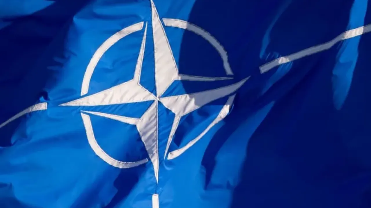 A NATO flag flies during the NATO Foreign Ministers&#39; Meeting in Brussels. Daniel Naupold/dpa