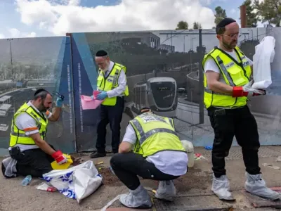 Police and rescue personnel at the scene of a terror attack at Ramot junction, near the entrance to Jerusalem, September 8, 2025. (photo credit: Chaim Goldberg/Flash90)