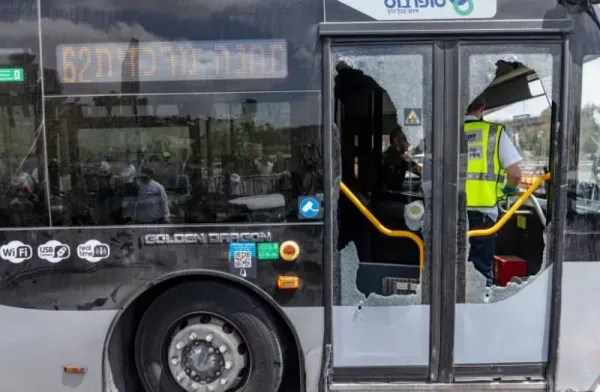 Police and rescue personnel at the scene of a terror attack at Ramot junction, near the entrance to Jerusalem, September 8, 2025. (credit: Chaim Goldberg/Flash90)