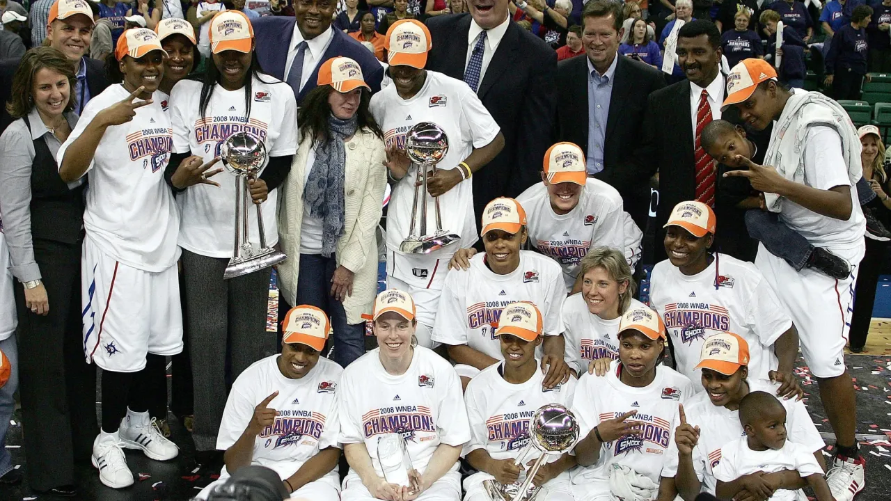 YPSILANTI, MI - OCTOBER 05: The Detroit Shock pose after beating the San Antonio Silver Stars in Game 3 of the WNBA Finals at the Eastern Michigan University Convocation Center on October 5, 2008 in Ypsilanti, Michigan. (Photo by Domenic Centofanti/Getty Images)