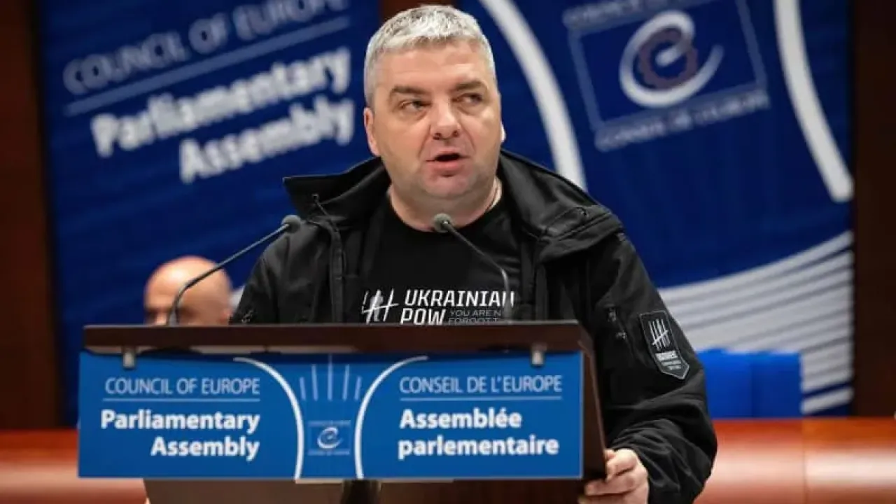 Ukrainian journalist and human rights activist Maxym Butkevych speaks to the audience after being awarded the Vaclav Havel Human Rights Prize at the European Council meeting. Sebastien Bozon/AFP/dpa