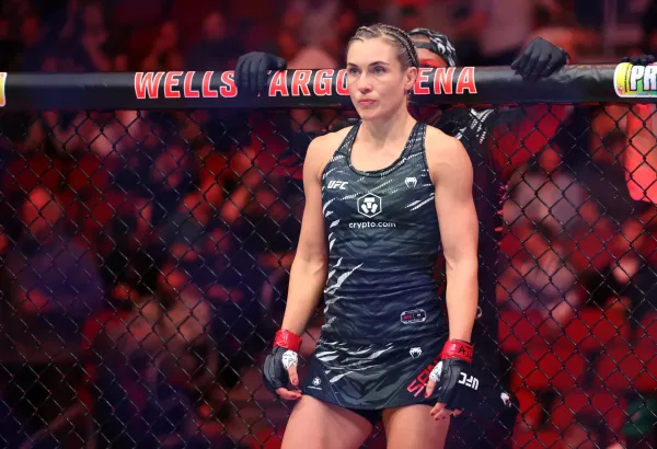 May 3, 2025; Des Moines, Iowa, UNITED STATES; Yana Santos (red gloves) prepares to fight Miesha Tate (not pictured) during UFC Fight Night at Wells Fargo Arena. Mandatory Credit: Reese Strickland-Imagn Images