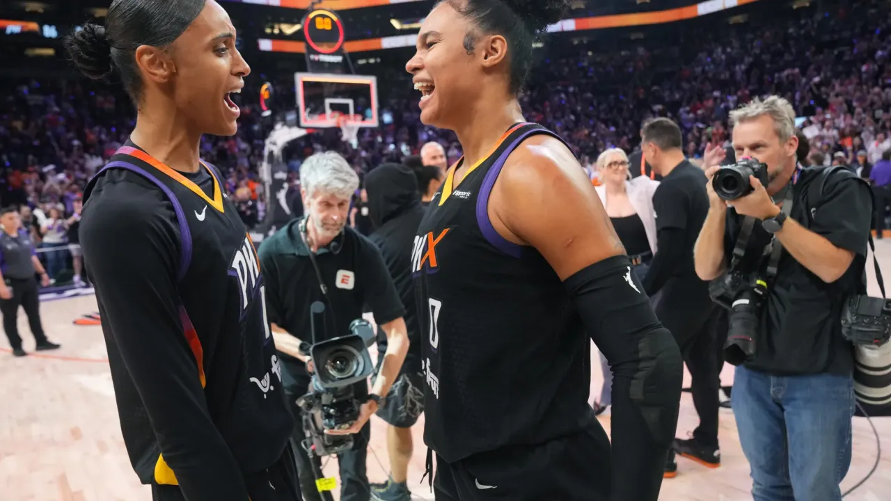 Phoenix Mercury teammates Satou Sabally (0) and DeWanna Bonner (14) celebrate their 86-81 WNBA semifinal playoff series win over the Minnesota Lynx at PHX Arena on Sept. 28, 2025.