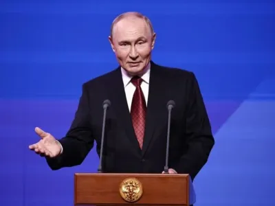 Russian President Vladimir Putin delivers a speech during an event celebrating the 878th anniversary of the foundation of Moscow at the Zaryadye Concert Hall. -/Kremlin/dpa