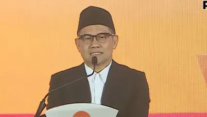 Ketua Umum Partai Kebangkitan Bangsa (PKB) Abdul Muhaimin Iskandar melontarkan kelakar saat menyampaikan pidato dalam Musyawarah Nasional (Munas) VI Partai Keadilan Sejahtera (PKS) di Hotel Sultan, Jakarta, Minggu (28/9/2025).
