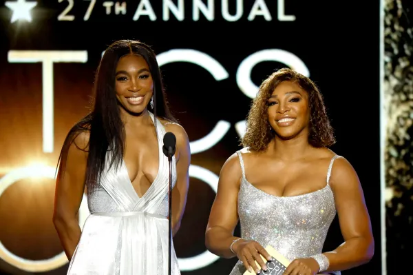 LOS ANGELES, CALIFORNIA - MARCH 13: (L-R) Venus Williams and Serena Williams speak onstage during the 27th Annual Critics Choice Awards at Fairmont Century Plaza on March 13, 2022 in Los Angeles, California. (Photo by Frazer Harrison/Getty Images )