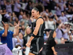 SAN JOSE, CALIFORNIA - SEPTEMBER 17: Janelle Salaun #13 of the Golden State Valkyries reacts after scoring against the Minnesota Lynx during the first half of Game Two in the first round of the WNBA Playoffs at Sap Center on September 17, 2025 in San Jose, California. (Photo by Thearon W. Henderson/Getty Images)