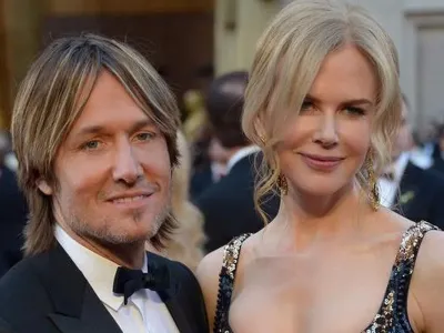 Aktris Nicole Kidman dan suaminya, penyanyi Keith Urban, hadir dalam acara red carpet Academy Awards 2013.