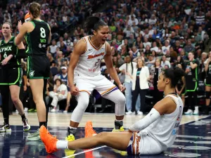 Alyssa Thomas and Satou Sabally celebrate during Game 2.
