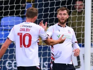 Bolton Wanderers celebrate a goal against Manchester City U21