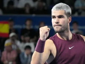 Carlos Alcaraz celebrates a point at the Japan Open