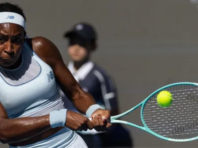 Coco Gauff playing a backhand