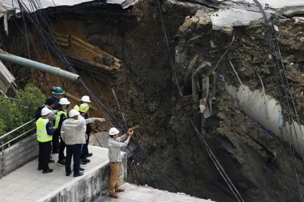 Dario Pignatelli/Bloomberg via Getty Engineers inspecting the site of a sinkhole in Bangkok, Thailand, on Wednesday, Sept. 24, 2025