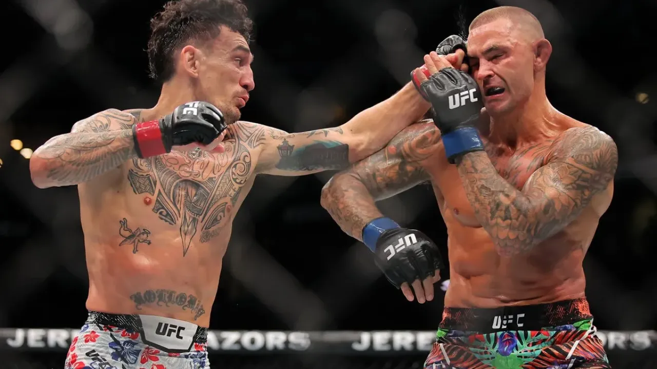 Dustin Poirier (right) during his retirement fight, a decision loss to Max Holloway in July (Getty Images)