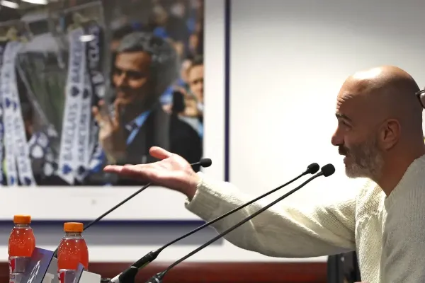 Enzo Maresca was overlooked by images of Mourinho as he spoke to the media (PA Wire)