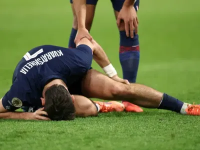 Georgian star Khvicha Kvaratskhelia came off prematurely during Paris Saint-Germain's win over Auxerre in Ligue 1 at the weekend (FRANCK FIFE)