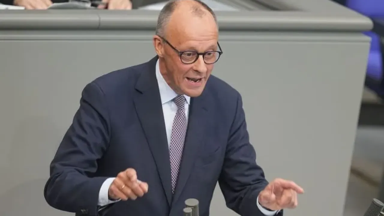 German Chancellor Friedrich Merz speaks during the general debate in the budget week in the Bundestag. Michael Kappeler/dpa