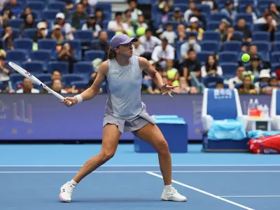 Iga Swiatek is into the last 16 in Beijing after her opponent retired injured (Getty Images)
