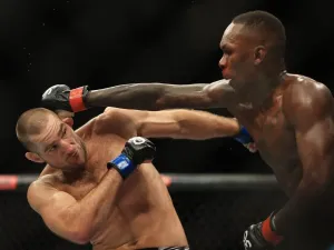 Israel Adesanya (right) was, surprisingly, easily outpointed by Sean Strickland in 2023 (Getty Images)