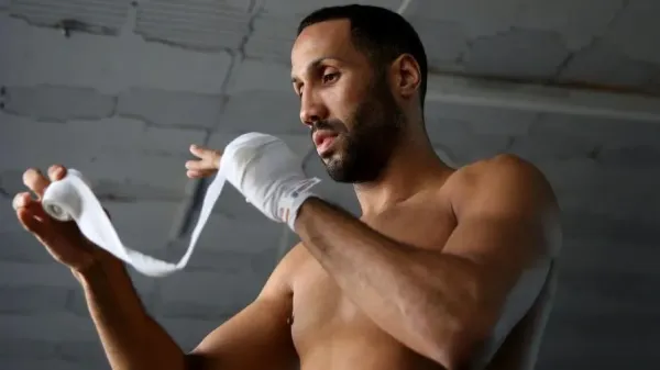 James DeGale wraps his hands in training