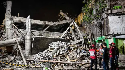 JUNI KRISWANTO/AFP via Getty The Al Khoziny boarding school after collapsing on Monday, Sept. 29 in Sidoarjo, Indonesia