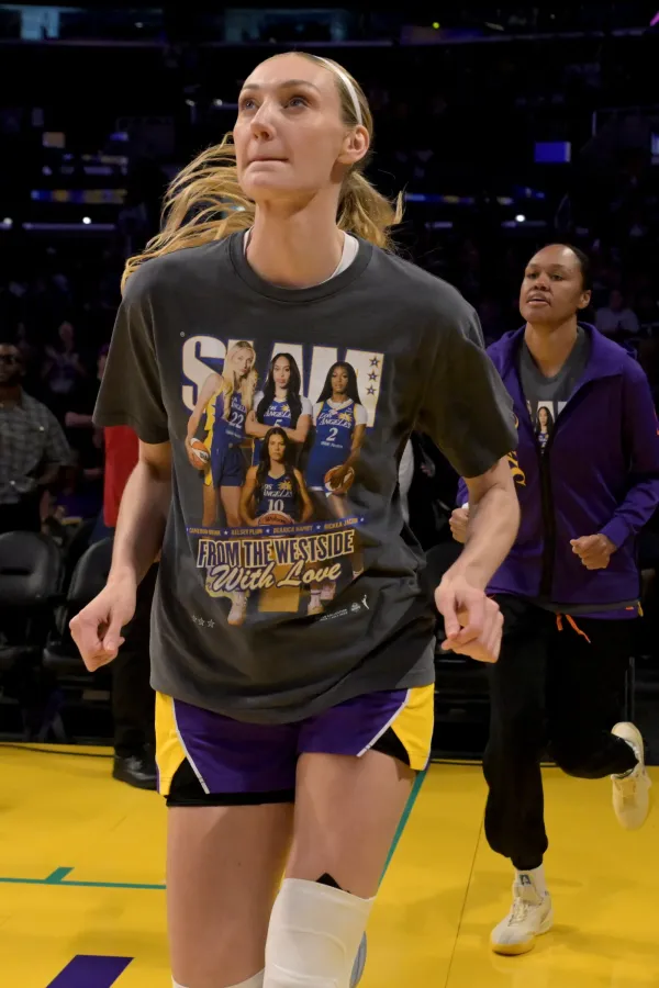 Los Angeles Sparks forward Cameron Brink runs on to the court to warm up for the game against the Dallas Wings.
