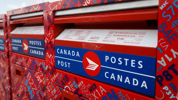 Mail boxes are seen at Canada Post's main plant in Calgary, Alberta, May 9, 2020. (Jeff McIntosh/The Canadian Press via AP)ASSOCIATED PRESS