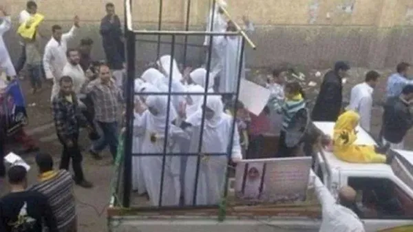 malouf.caged.women.jpeg
