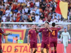 Matias Soule celebrates scoring Roma's second goal against Verona on Sunday (Alberto PIZZOLI)