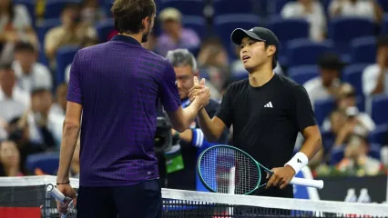 Medvedev eventually quit the match against Tien after his mobility was limited (REUTERS)