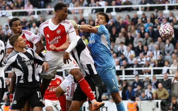 Nick Pope tries to reach the ball as Gabriel heads in Arsenal's winner