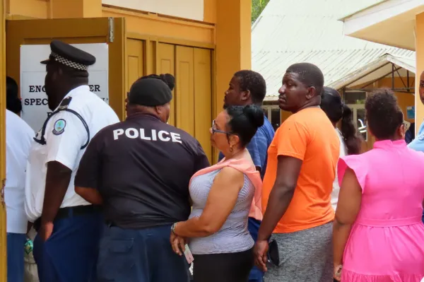 People line up to cast their votes at the English River School in Victoria, Seychelles, Thursday, Sept. 25, 2025. (AP Photo/Emilie Chetty)ASSOCIATED PRESS
